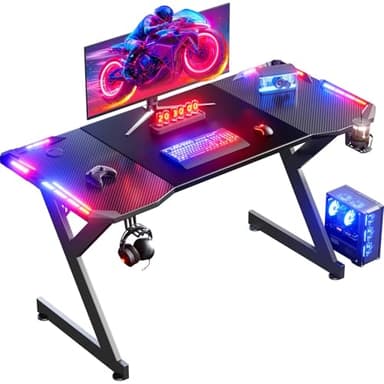 HLFURNIEU LED Bureau Gaming 140 x 60 cm, Bureau Gamer avec Plateau en Fibre de Carbone, Table Gaming Ergonomique avec Porte Gobelet et Crochet pour Casque, Noir